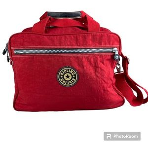 Kipling Red Private Transport weekend travel bag with rear trolley sleeve